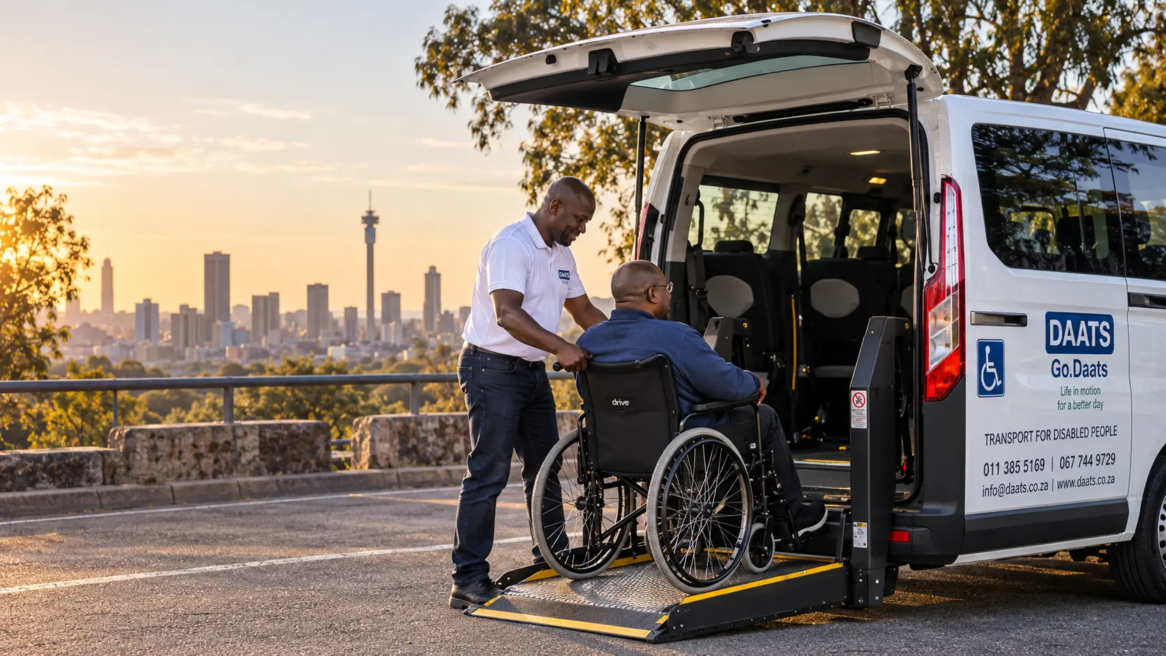 A DAATS team member helping a wheelchair passenger board an accessible vehicle in Johannesburg
